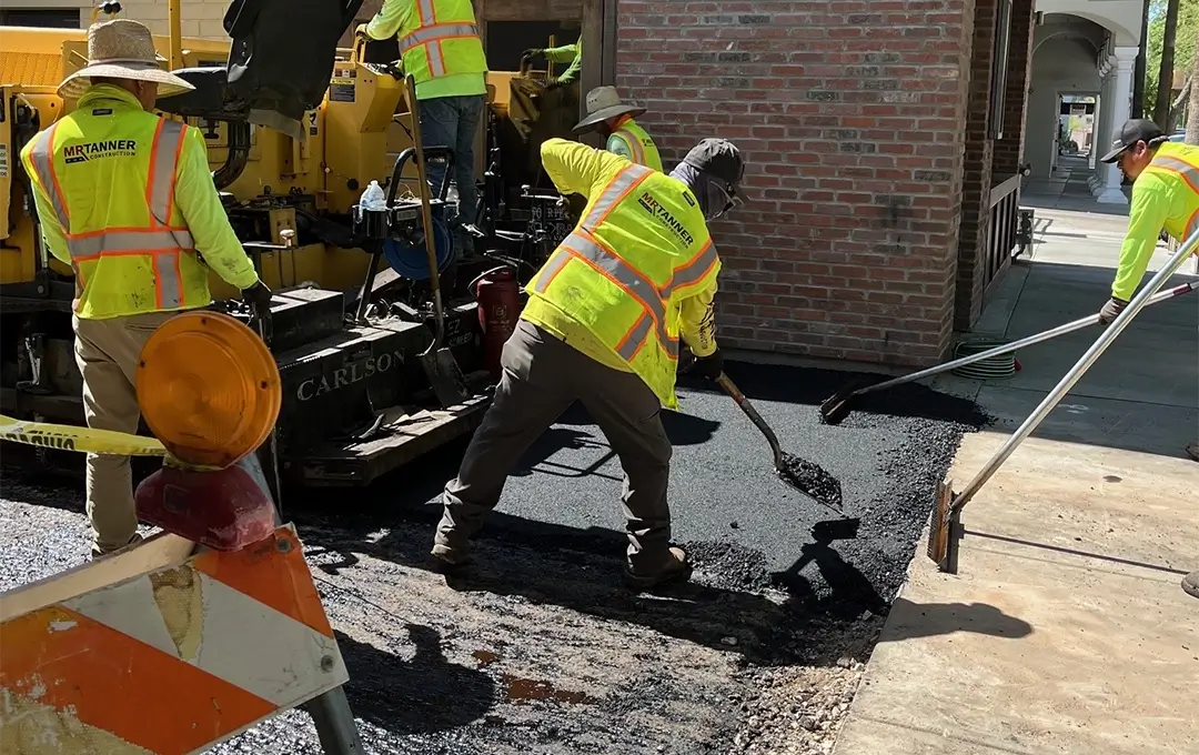 workers repaving a street